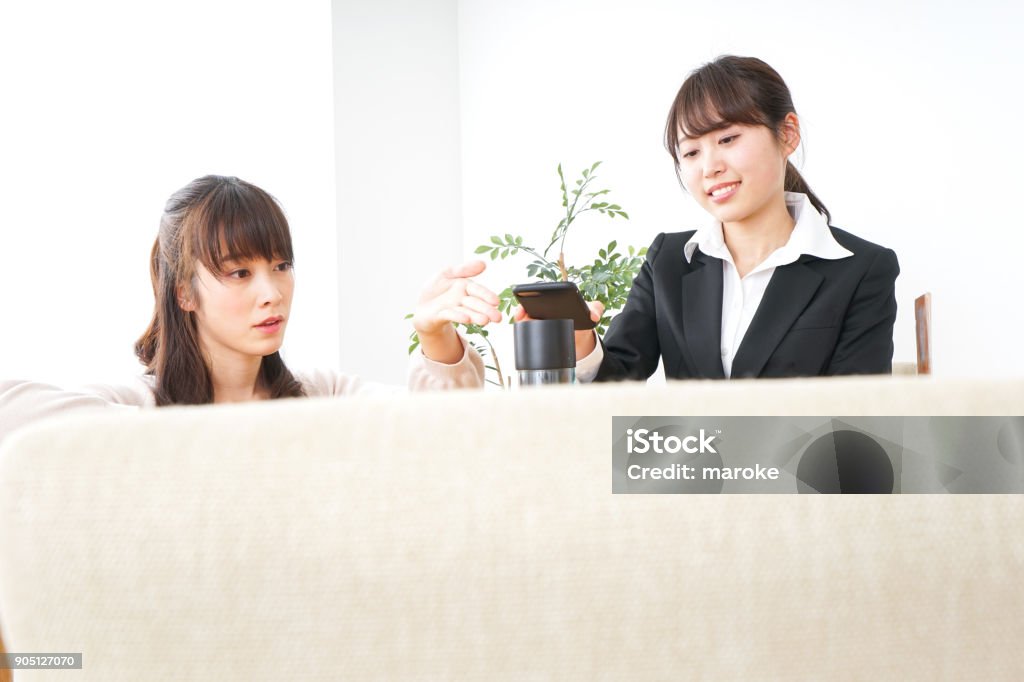 Young woman shopping with electronic money Adult Stock Photo