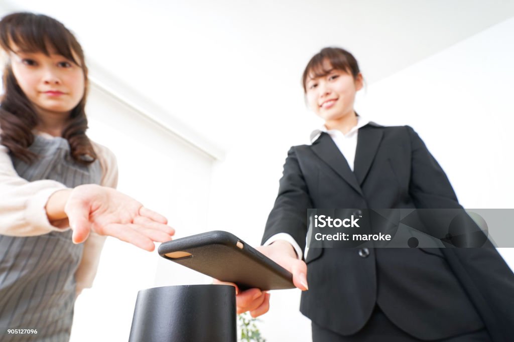 Young woman shopping with electronic money Checkout Stock Photo