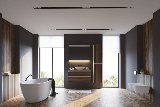 istock White and dark wooden bathroom interior 905135456