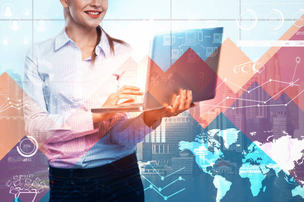 istock Businesswoman using laptop with business chart 905142678