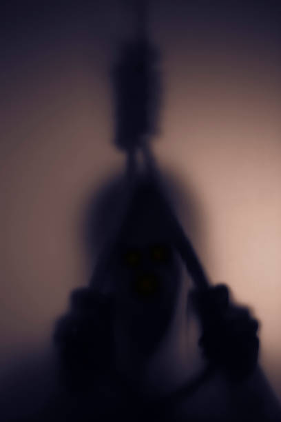 Shadow blur of man who want to commit suicide by hanging rope noose Shadow blur of man who want to commit suicide by hanging rope noose, fine image of classic rope noose and shadow silhouette of the hanging noose stock pictures, royalty-free photos & images