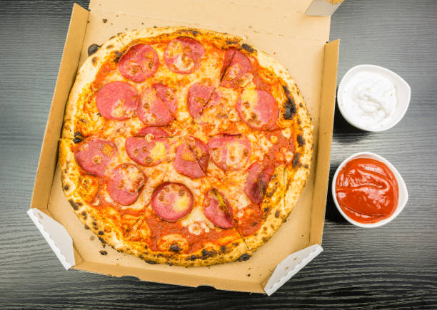 istock Pizza served in a cardboard box. 905151944