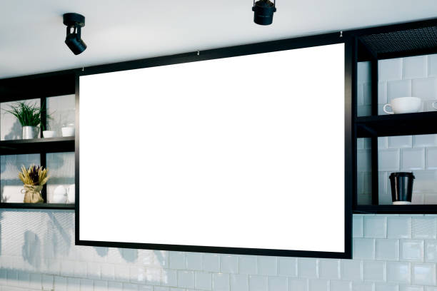 istock Empty wall banner at cafe mockup, side view. Coffe cups and plants on shelf in background. Scandinavian interior design 905152588