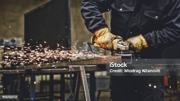 Worker With The Grinder Stock Photo - Download Image Now - Metal, Steel, Construction Industry