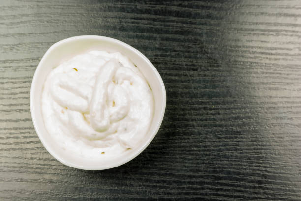 istock Garlic sauce in a bowl. View from above. 905160544