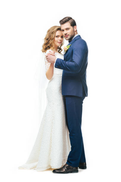 istock young bride and groom dancing together isolated on white 905163100