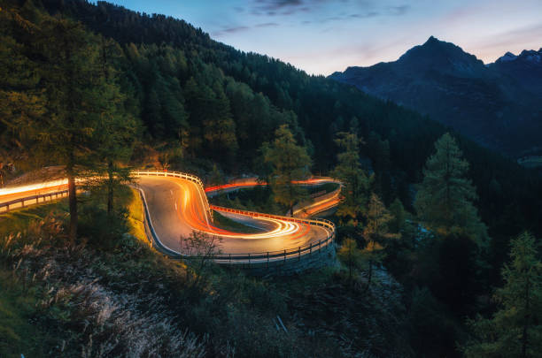 winding road of maloja pass in switzerland - road landscape journey road trip imagens e fotografias de stock