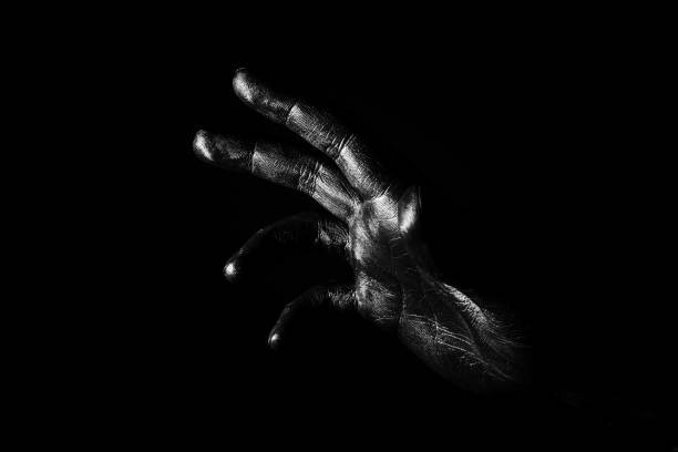 istock Hand palm of a man painted black 905172628