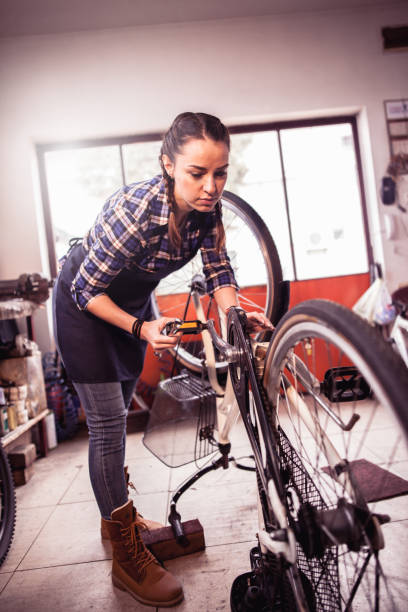 istock Female Bicycle Mechanic 905172644