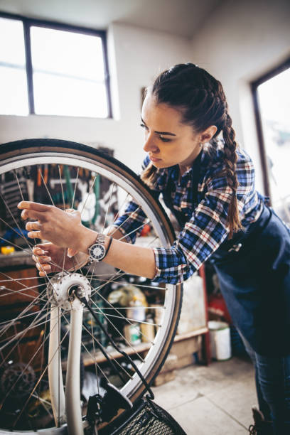 istock Female Bicycle Mechanic 905172974