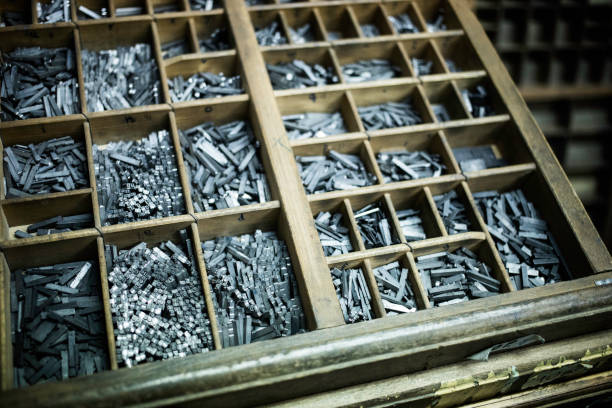 Movable type. Close-up of the letters and metal blocks of an old printing house, random arrangement