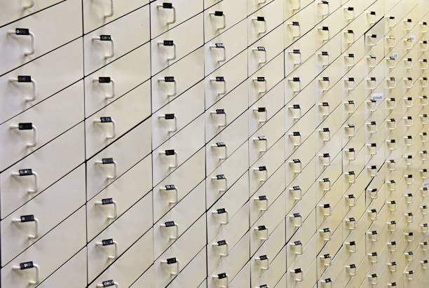istock Background with wooden white drawers. 905176932