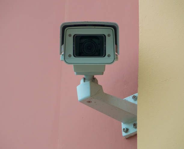 istock surveillance camera on a building wall, close-up 905180258