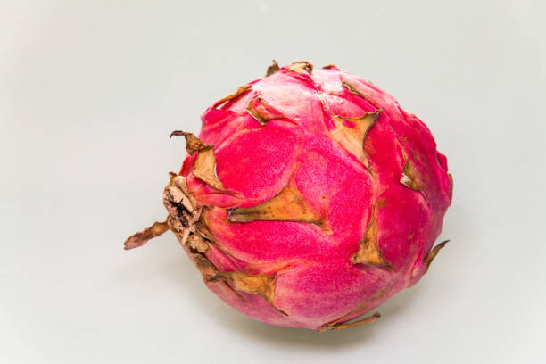 istock Dragon Fruit view in close up with blur isolated white background 905184488