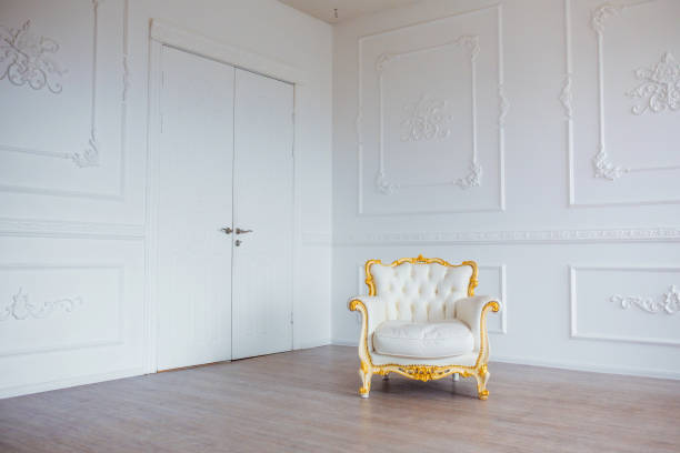 istock White leather vintage style chair in classical interior room 905185472
