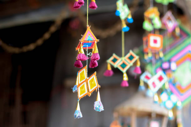 istock Colorful mobile hang on the thatched roof 905188500