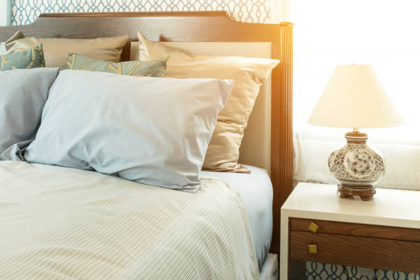 istock classic style bedroom with blue pillows and chinese lamp style on bedside table 905192086