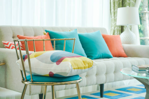 Closeup pillow on vintage chair with sofa in living room stock photo