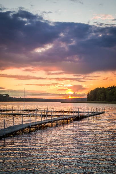 istock Dramatic clouds at the lake in summer, Poland 905192382