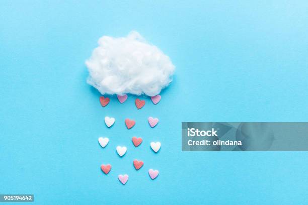 Cotton Ball Cloud Rain Sugar Candy Sprinkle Hearts Red Pink White On Blue Sky Background Applique Art Composition Kids Style Valentines Love Charity Concept Greeting Card Poster Copy Space Stock Photo - Download Image Now