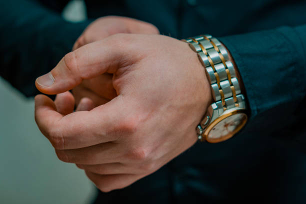 istock Wrist watch on the wrist. Close-up. 905203560