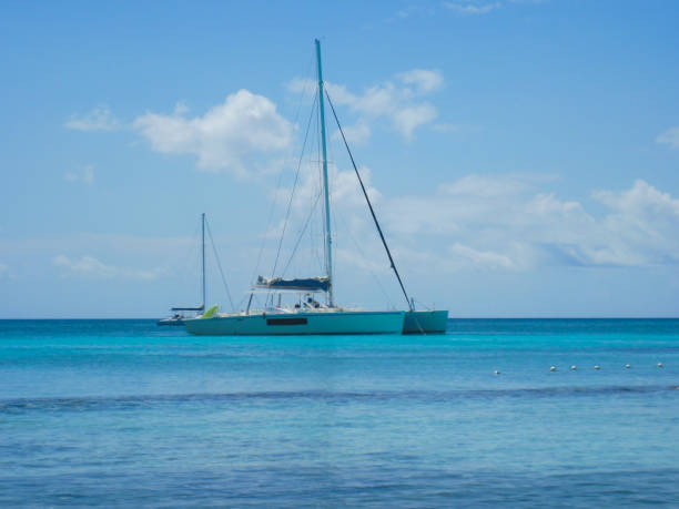 istock Ship on the sea horizon Blue Background The seascape 905203620