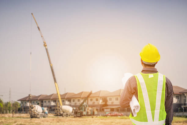 istock Asian business man construction engineer worker at house building site 905205856