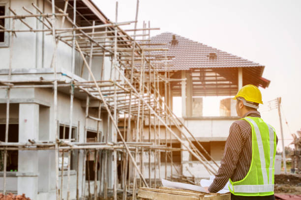 istock Asian business man construction engineer worker at house building site 905205866
