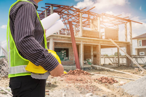istock Asian business man construction engineer worker at house building site 905205874