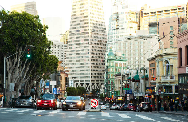 San Francisco, CA, USA - May 07, 2017: Cars on the street and the city in background.