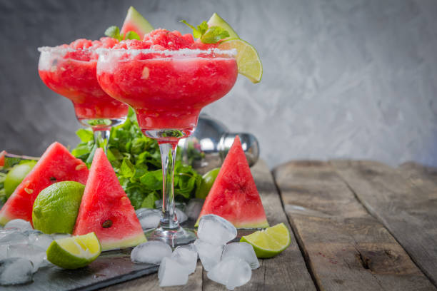 Watermelon margaritas with lime and mint stock photo