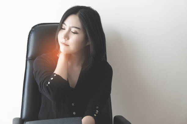 female office worker is suffering from neck pain, office syndrome concept. - physical injury backache occupation working imagens e fotografias de stock