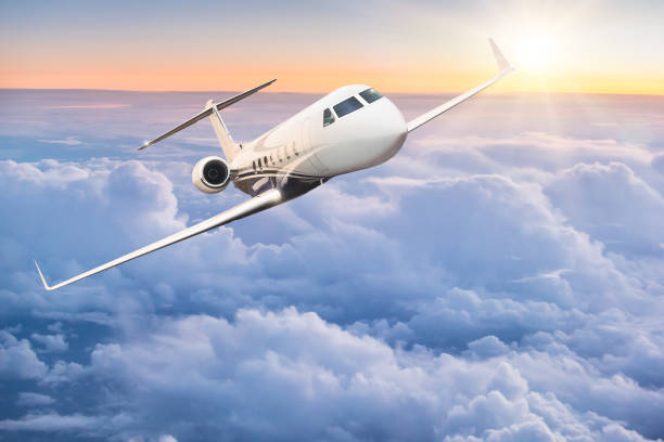 istock Commercial airplane flying above clouds 905228796