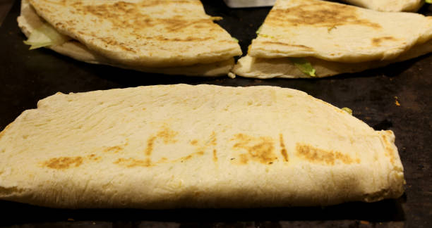istock very big flatbread  cooked on a hot plate in the Italian restaurant 905231022