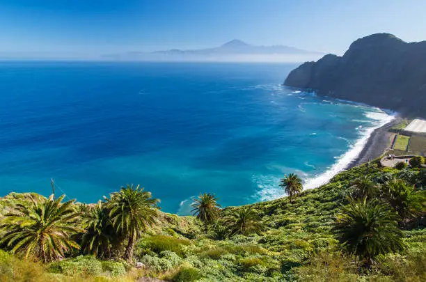 View of Santa Catalina beach and mountains with Tenerife island in the background, La Gomera island, Spain