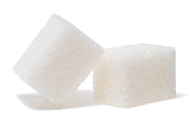 istock Group of sugar cubes isolated on white background 905234522