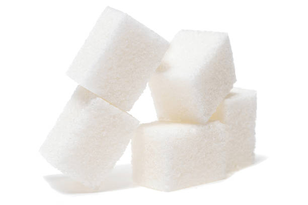 istock Group of sugar cubes isolated on white background 905234562