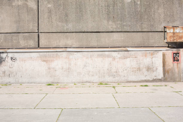 istock Grunge concrete wall and floor closeup 905235130