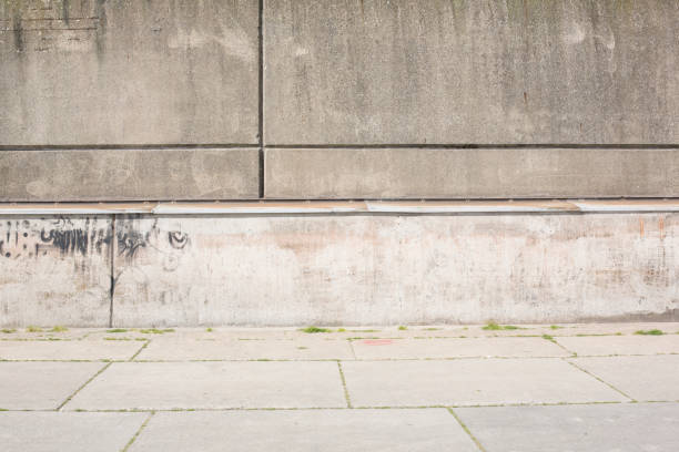 istock Grunge concrete wall and floor closeup 905235192
