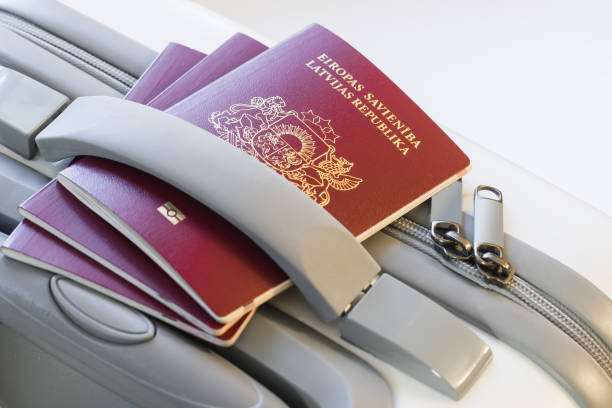 istock passports under the suitcase handle close-up 905244600