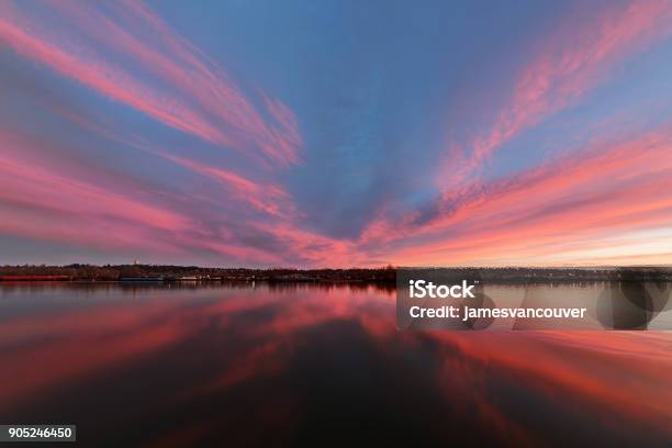 Sunset Glow Over River And Riversides Stock Photo - Download Image Now - Apartment, Beauty, Blue