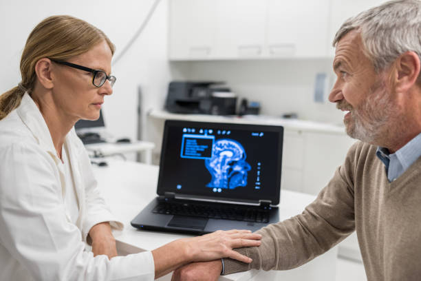 istock Female Doctor Consoling Patient 905254760