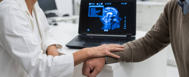 istock Female Doctor Consoling Patient 905255260