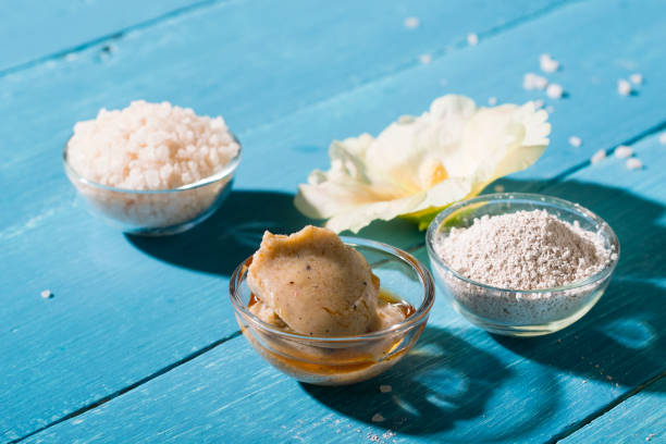 istock Shea butter, makeup base, cosmetic clay, cream on blue 905255854