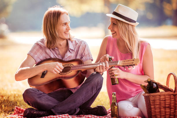 istock Couple having fun in the park 905268150
