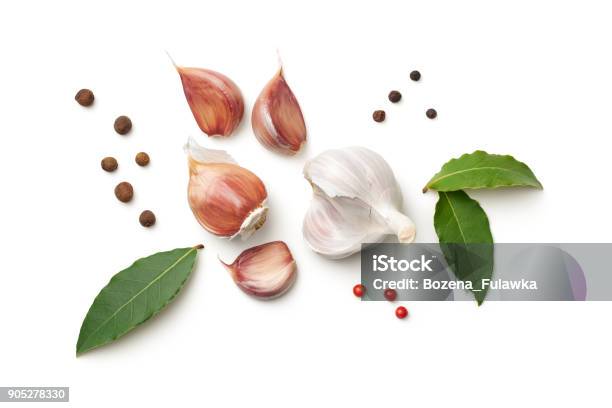 Garlic Bay Leaves Allspice And Pepper Isolated On White Background Stock Photo - Download Image Now