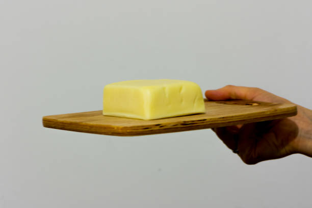 istock woman holdin the cheese 905289838