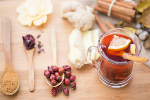 istock Healthy herbal tea,  spiced tea over wood background 905292764