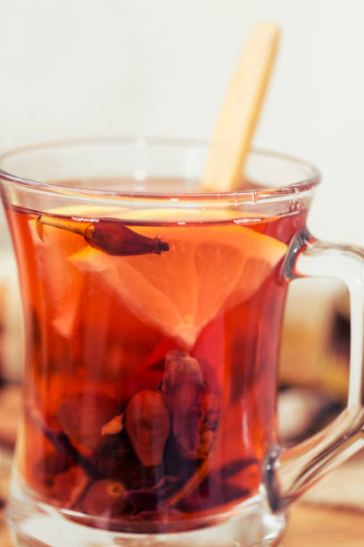 istock Healthy herbal tea,  spiced tea over wood background 905292766