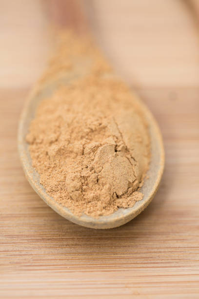 istock Wooden spoon with dry herbal tea. 905292894